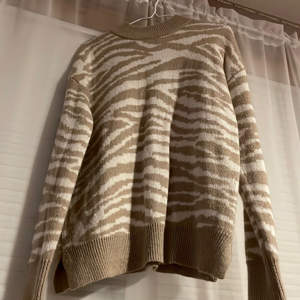 Zebra print cream mock neck sweater
